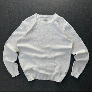 White knitted sweater